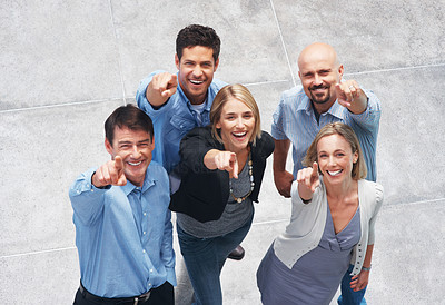 You are the one - Happy businesspeople pointing at you