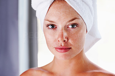 Closeup of a woman with a towel wrapped on head