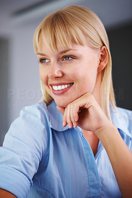 Business woman with hand on chin