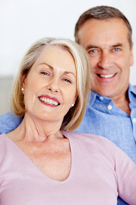 Smiling mature woman and man together having a good time