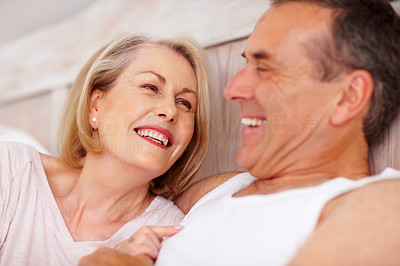 Romantic couple - Cheerful mature couple looking at each other