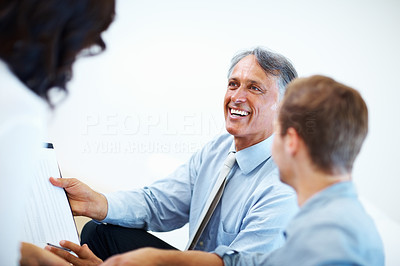 Male advisor with clients