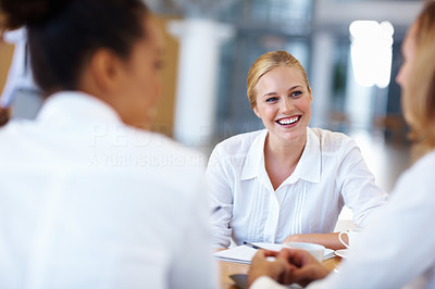 Business woman in meeting with executives