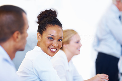 Smiling African American executive in meeting