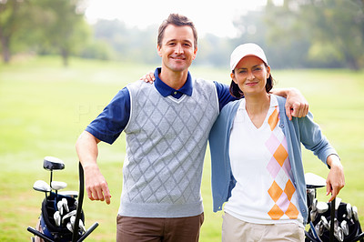 Couple ready to play golf