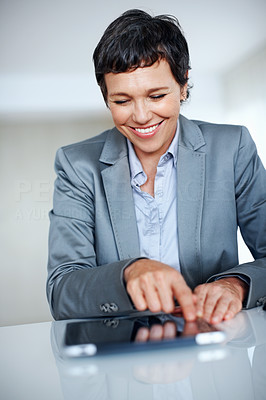 Smiling business woman with tablet PC