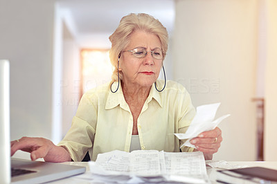 Paying her bills online