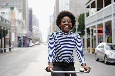 She enjoys cycling through the city