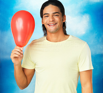 Man with red balloon