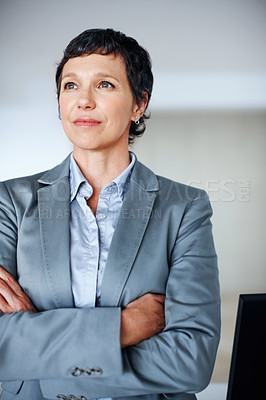 Business woman thinking in office