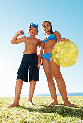 Brother and sister in a swimming costume