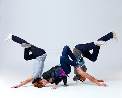 Young bboying group performing cool dance moves