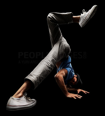 Young male street dancer showing his dancing skills