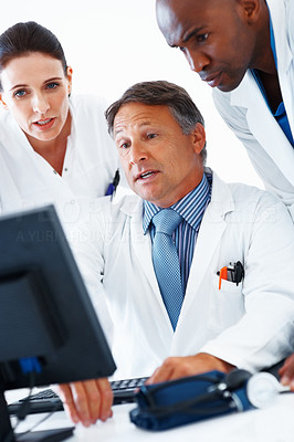 Medical team using computer