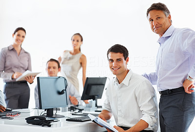 Business men smiling at work