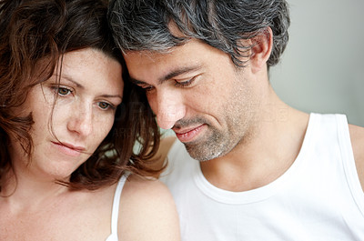 Closeup of unhappy mature couple together