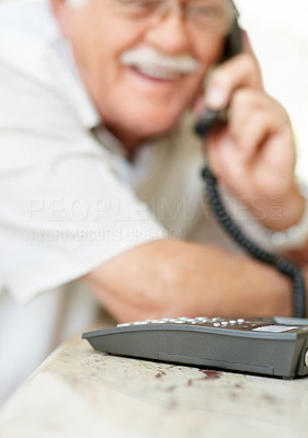 Telephone - Old man talking on phone