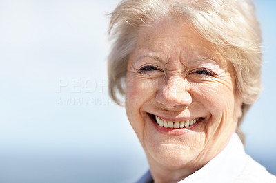 Closeup of a beautiful old woman smiling - Outdoor