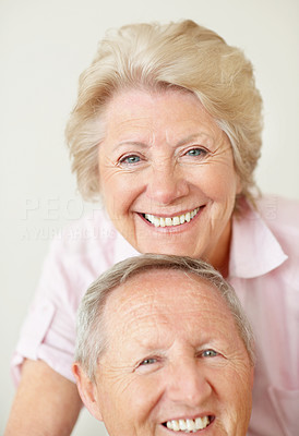 Portrait of a sweet old couple smiling together