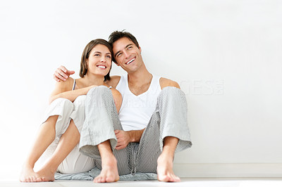 Sweet young couple thinking about copyspace