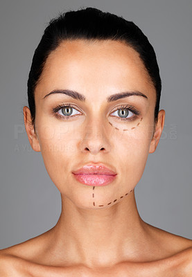 Woman face with facial plastic surgery marks