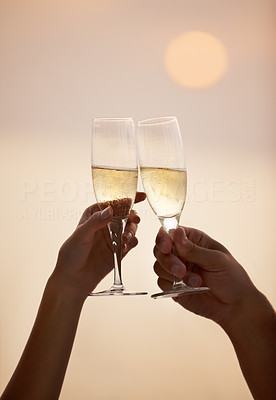 Cheers - Man and woman clinking champagne flutes