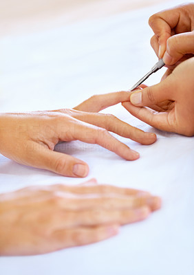 Beautician working on hands