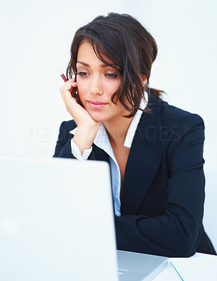 Closeup of a business woman using laptop isolated on white