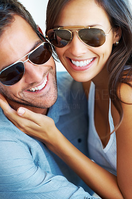 Smiling couple in sunglasses