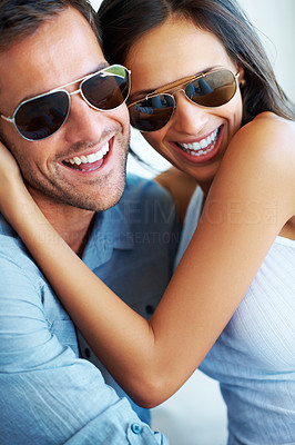 Couple in sunglasses spending happy time together