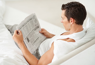 Reading the morning newspaper