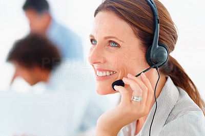 Portrait of a pretty young customer representative wearing headset