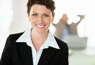 Closeup of a happy middle aged business woman smiling
