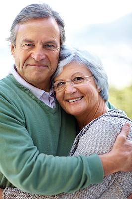 Happy senior couple hugging - Outdoor