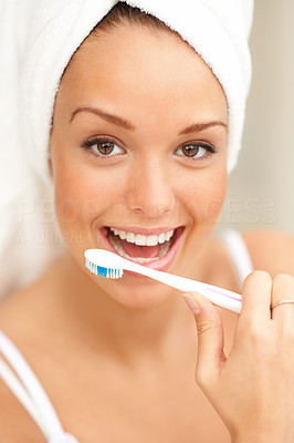 Woman with mouth open and toothbrush in white background
