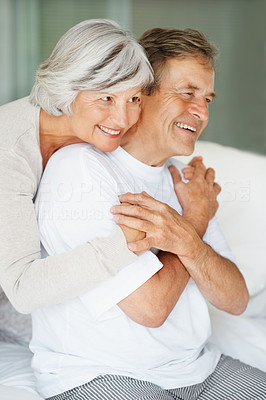 Loving senior couple spending quality time together at home