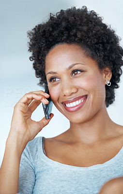 Lovely woman smiling during phone call