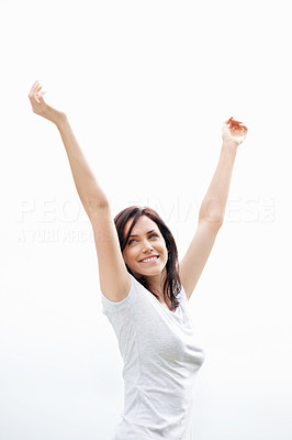 Happy Caucasian female with her hands raised on white background