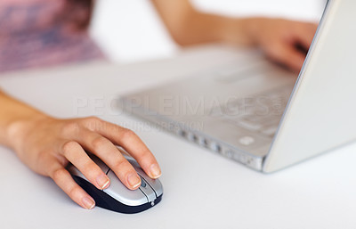 Business woman operating mouse