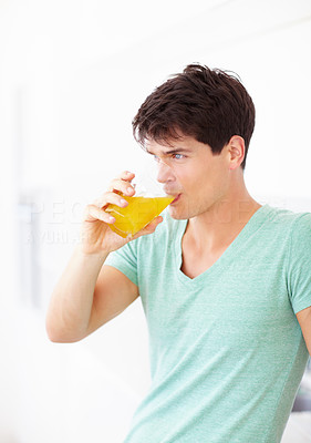 Sipping on fresh and tasty orange juice