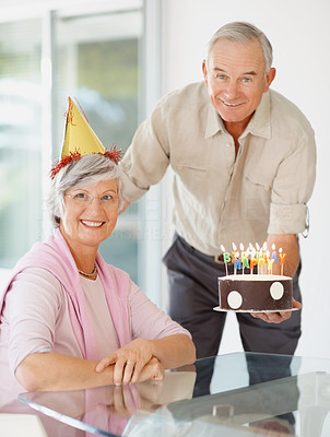 Happy senior couple celebrating a birthday
