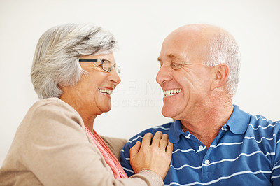 Closeup of a loving senior couple looking at each other