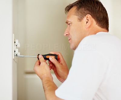 Electrician fixing the switch board