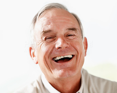 Closeup portrait of a senior man laughing