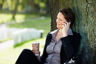Business woman using a cellphone