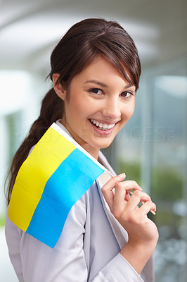 Elegant young woman with a Ukraine flag