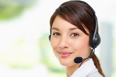 Cute young woman wearing a headset , call centre