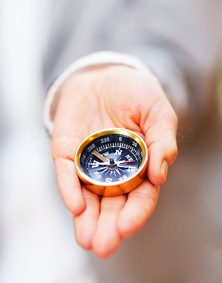 Compass in the palm of a hand