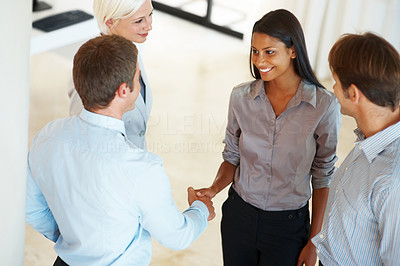 Business people shaking hands making an agreement