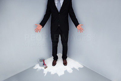 Business man trapped at the corner of a wet painted floor, low section